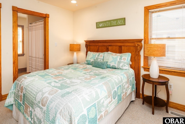 bedroom featuring baseboards, recessed lighting, visible vents, and light colored carpet