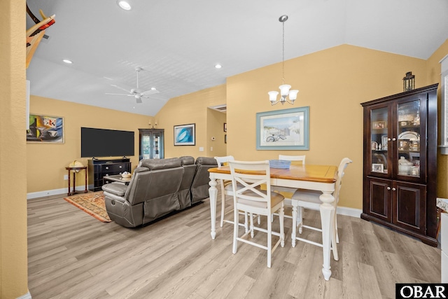 1021 Harbour View Dr Lot 43, Kill Devil Hills, NC 27948 - dining room with lofted ceiling, light wood-type flooring, a chandelier, and a ceiling fan