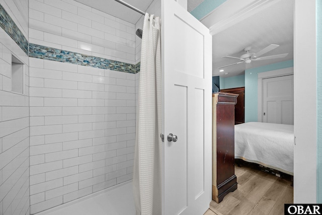 1021 Harbour View Dr Lot 43, Kill Devil Hills, NC 27948 - ensuite bathroom with wood finished floors, a ceiling fan, and tiled shower