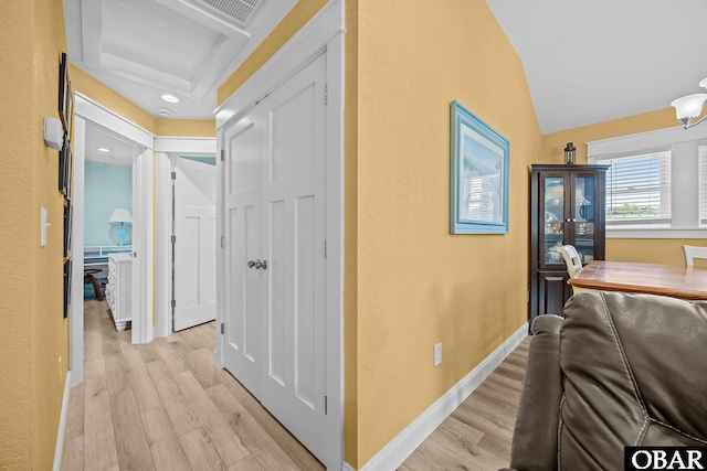 1021 Harbour View Dr Lot 43, Kill Devil Hills, NC 27948 - hallway featuring light wood-style flooring, lofted ceiling, and a textured wall