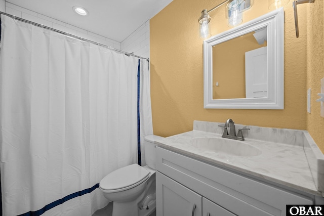 1021 Harbour View Dr Lot 43, Kill Devil Hills, NC 27948 - full bathroom featuring a textured wall, vanity, and recessed lighting
