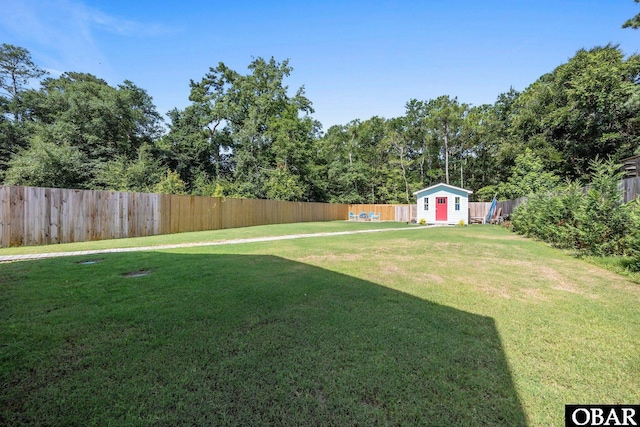 1021 Harbour View Dr Lot 43, Kill Devil Hills, NC 27948 - fenced backyard featuring a storage unit