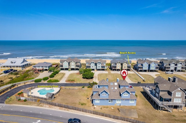 bird's eye view featuring a water view and a residential view