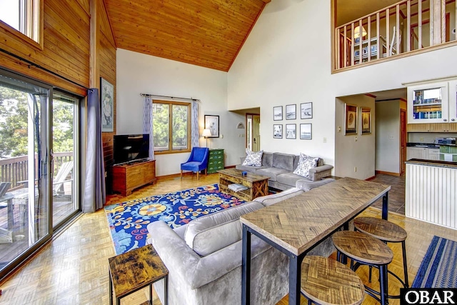 50050 Bayside Ct Lot 30, Frisco, NC 27936 - living area with high vaulted ceiling, healthy amount of natural light, baseboards, and wood ceiling