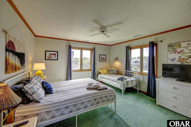 50050 Bayside Ct Lot 30, Frisco, NC 27936 - bedroom with carpet floors, ornamental molding, a ceiling fan, a textured ceiling, and baseboards