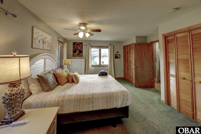 50050 Bayside Ct Lot 30, Frisco, NC 27936 - carpeted bedroom with multiple closets, a textured ceiling, ceiling fan, and baseboards