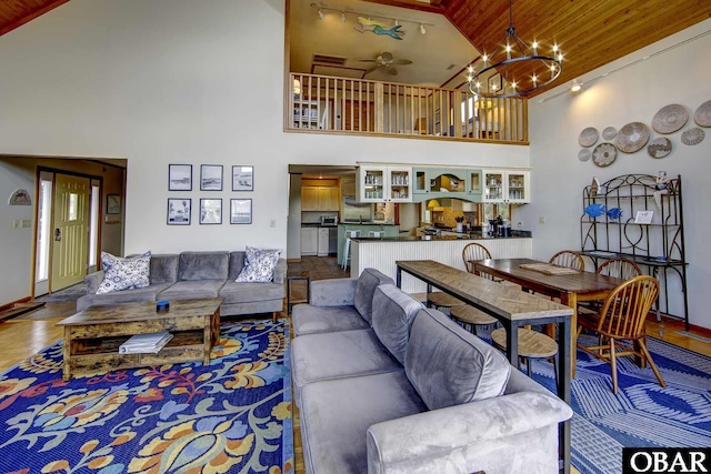 50050 Bayside Ct Lot 30, Frisco, NC 27936 - living area featuring wooden ceiling, high vaulted ceiling, ceiling fan, baseboards, and a chandelier