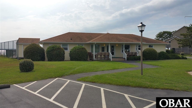 4327 S Hammerhead Dr Lot # 37, Nags Head, NC 27959 - ranch-style house with a porch and a front lawn