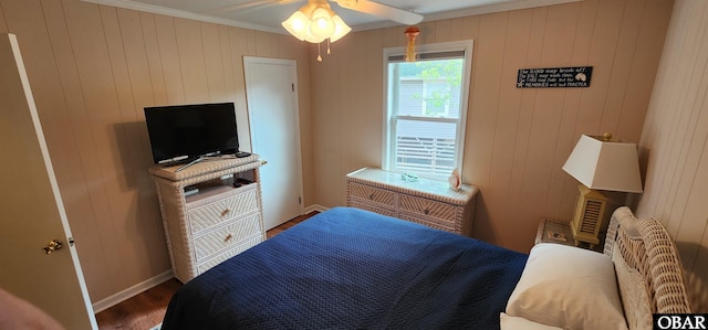 4327 S Hammerhead Dr Lot # 37, Nags Head, NC 27959 - bedroom with wood finished floors, ornamental molding, baseboards, and wooden walls