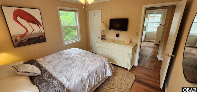4327 S Hammerhead Dr Lot # 37, Nags Head, NC 27959 - bedroom with wood finished floors, crown molding, and wooden walls