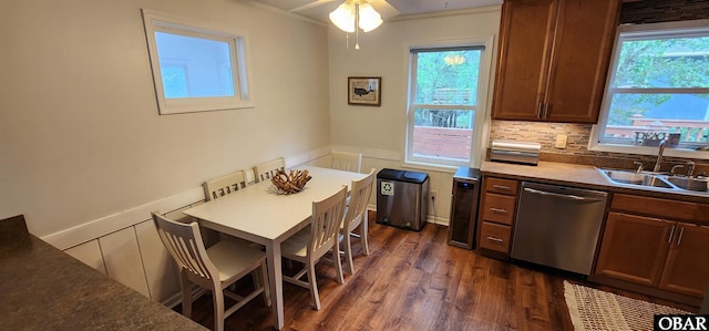 4327 S Hammerhead Dr Lot # 37, Nags Head, NC 27959 - kitchen with a sink, stainless steel dishwasher, a wainscoted wall, dark wood-style flooring, and healthy amount of natural light