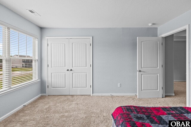 115 Sligo Way Lot 10, Moyock, NC 27958 - carpeted bedroom with a closet and baseboards