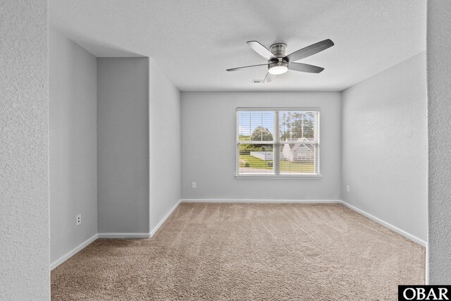 115 Sligo Way Lot 10, Moyock, NC 27958 - unfurnished room featuring ceiling fan, carpet floors, and a textured ceiling