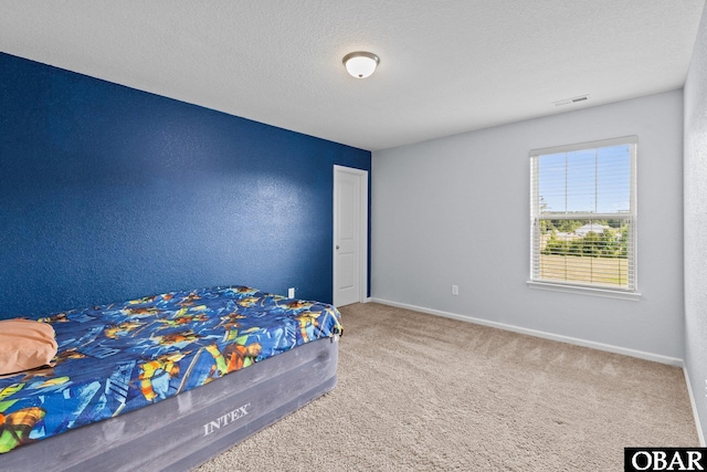115 Sligo Way Lot 10, Moyock, NC 27958 - bedroom with carpet flooring and a textured ceiling