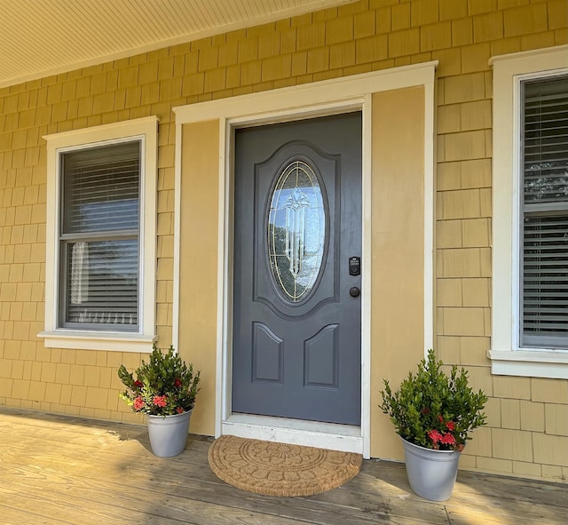 doorway to property with covered porch