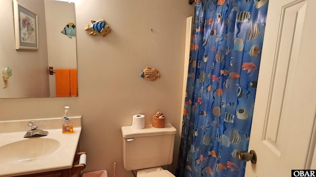 1809 Apache St Lot 3, Kill Devil Hills, NC 27948 - full bathroom with toilet, vanity, and curtained shower