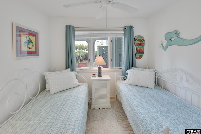 1143 Albemarle Ct Unit 681, Corolla, NC 27927 - carpeted bedroom with a ceiling fan and baseboards