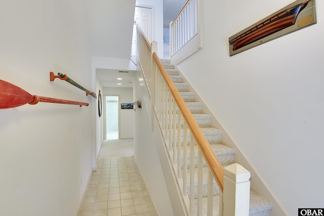 1143 Albemarle Ct Unit 681, Corolla, NC 27927 - stairs featuring baseboards and tile patterned floors