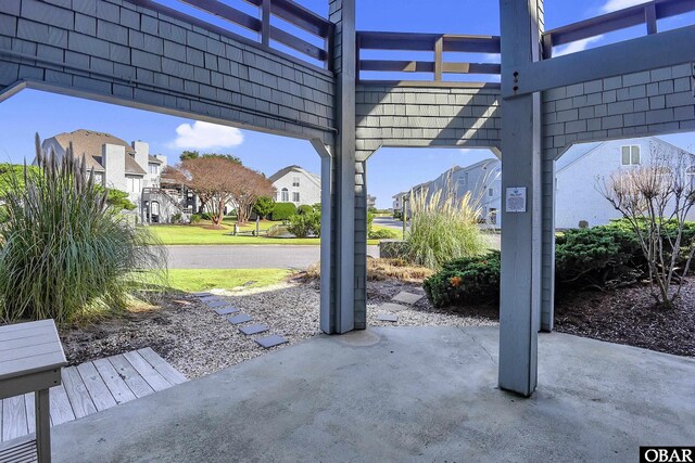 1143 Albemarle Ct Unit 681, Corolla, NC 27927 - view of patio / terrace featuring a residential view