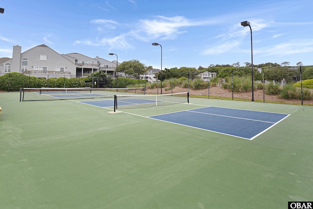 1143 Albemarle Ct Unit 681, Corolla, NC 27927 - view of tennis court featuring community basketball court