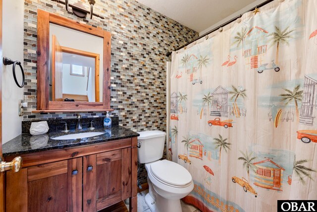 full bathroom featuring toilet, decorative backsplash, tile walls, and vanity