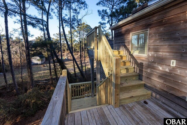 wooden terrace with stairs