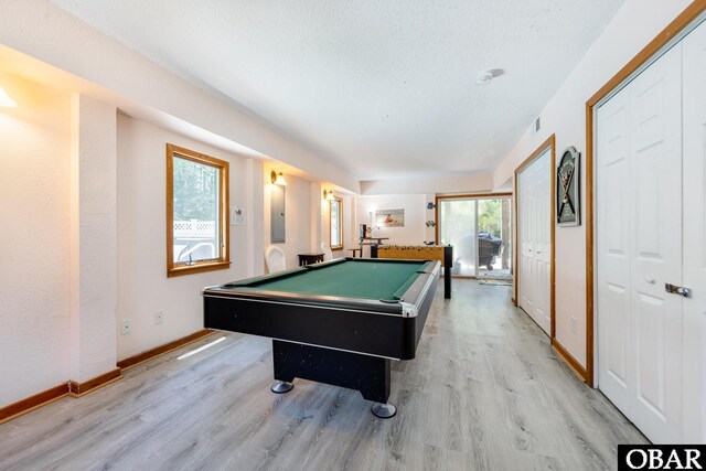 game room featuring baseboards, wood finished floors, and pool table