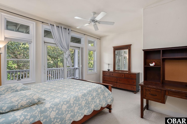 bedroom with light carpet, a ceiling fan, and access to exterior