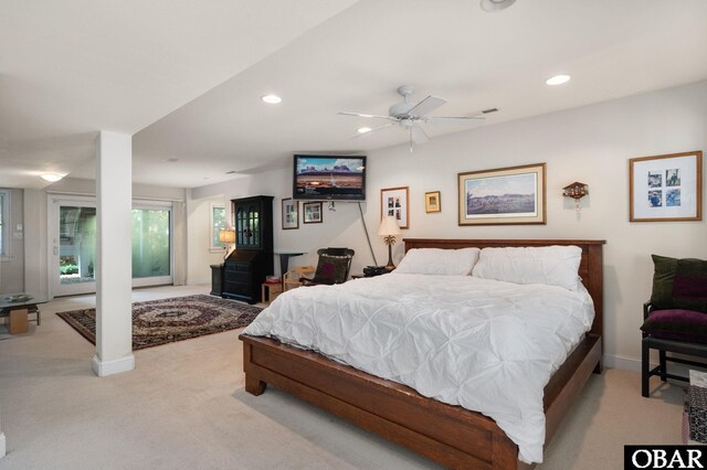 bedroom with recessed lighting, light carpet, and baseboards