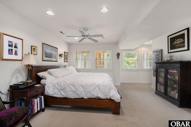 bedroom with recessed lighting, light colored carpet, visible vents, and baseboards