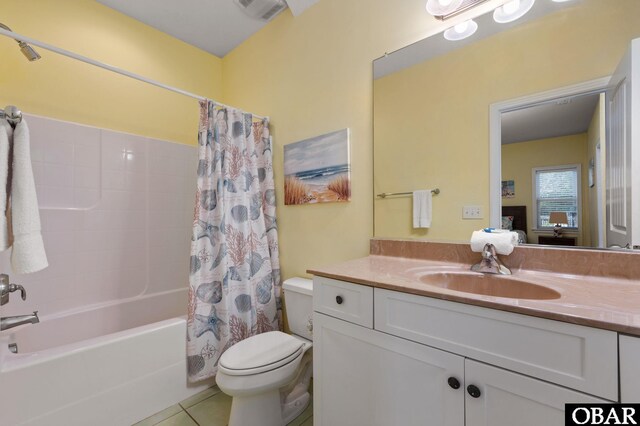 bathroom with shower / bath combination with curtain, visible vents, toilet, vanity, and tile patterned flooring