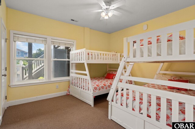 bedroom featuring carpet, visible vents, and baseboards