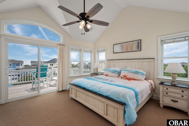 carpeted bedroom featuring access to outside, multiple windows, high vaulted ceiling, and ceiling fan