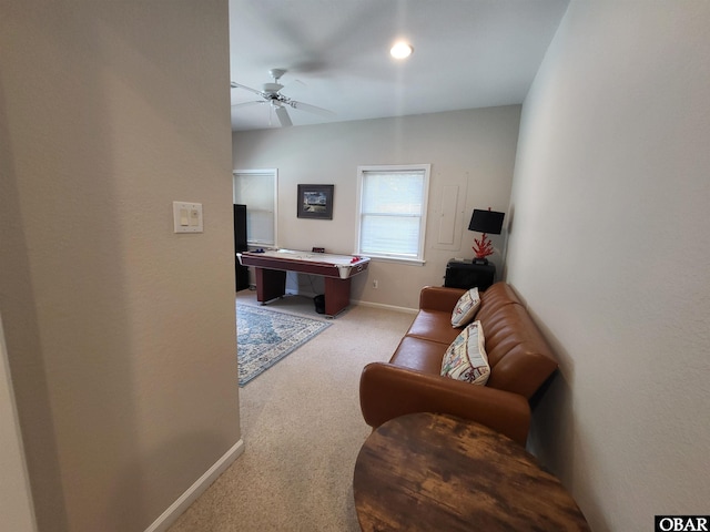 recreation room with carpet flooring, baseboards, and a ceiling fan
