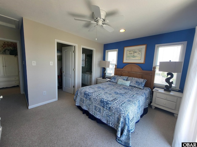 bedroom featuring a ceiling fan, ensuite bath, recessed lighting, and carpet floors