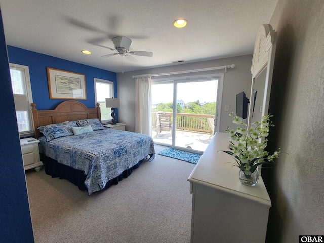 carpeted bedroom featuring a ceiling fan, recessed lighting, visible vents, and access to exterior