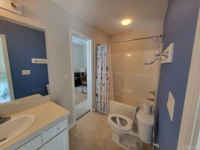 full bathroom with toilet, shower / bath combo with shower curtain, and vanity