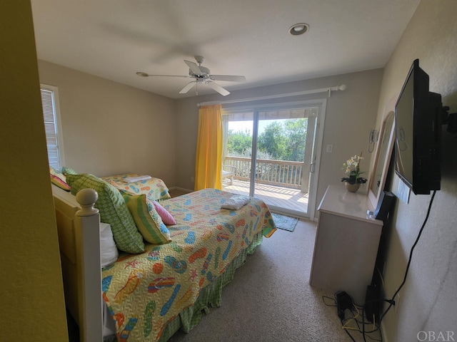 bedroom featuring ceiling fan, light colored carpet, and access to exterior