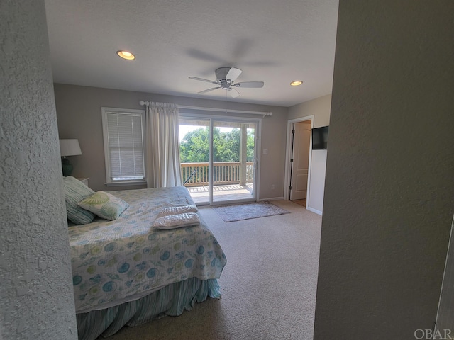 bedroom with access to exterior, carpet floors, a textured wall, a ceiling fan, and baseboards