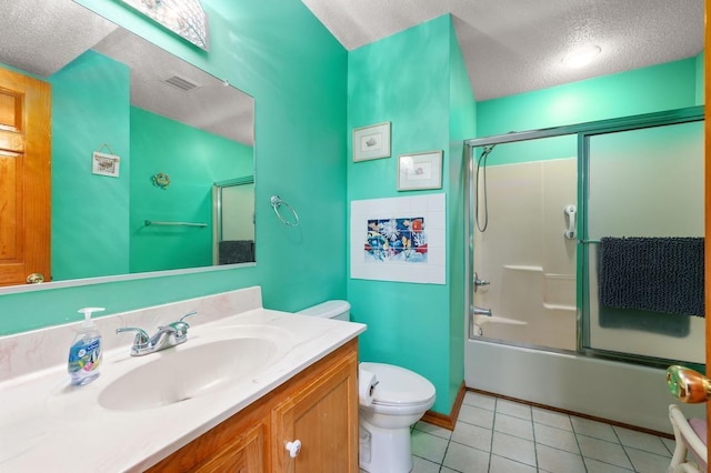 full bath with visible vents, toilet, enclosed tub / shower combo, tile patterned floors, and vanity