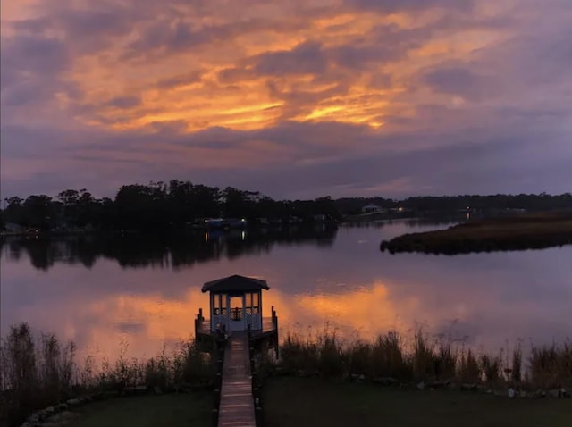 water view featuring a dock