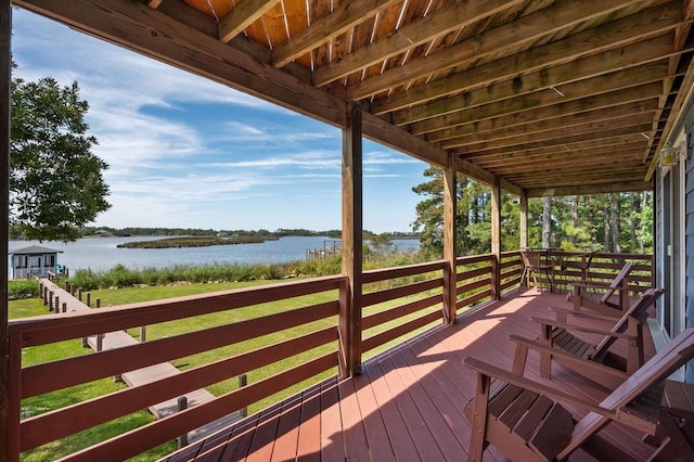 deck featuring a water view