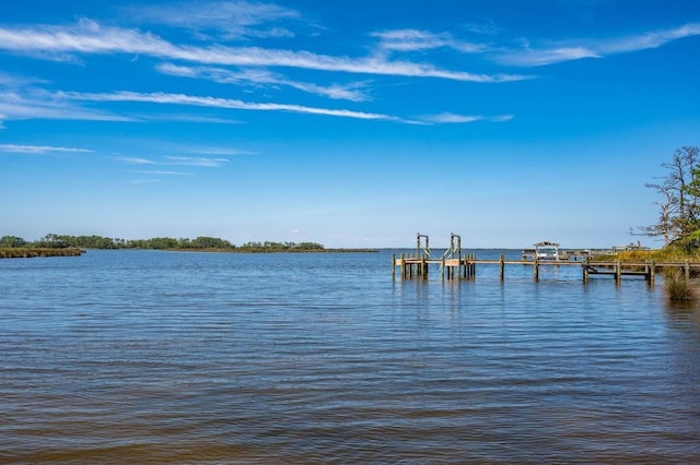 view of dock with a water view