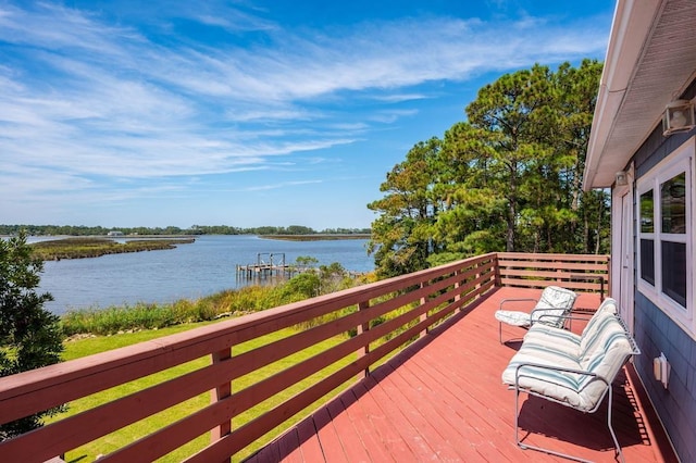 balcony featuring a deck with water view