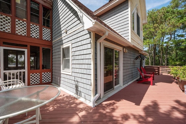 wooden deck with outdoor dining area