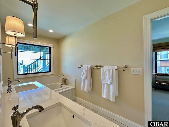 126 Buffell Head Rd Lot 146, Duck, NC 27949 - bathroom featuring a sink, baseboards, a bath, and recessed lighting