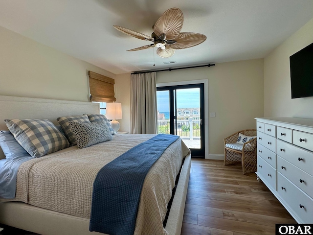 126 Buffell Head Rd Lot 146, Duck, NC 27949 - bedroom with access to exterior, dark wood-style floors, a ceiling fan, and baseboards
