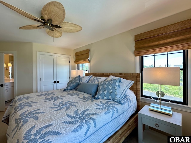 126 Buffell Head Rd Lot 146, Duck, NC 27949 - bedroom featuring ceiling fan, a closet, and connected bathroom