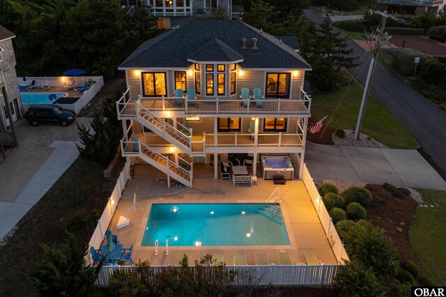 126 Buffell Head Rd Lot 146, Duck, NC 27949 - view of patio with a hot tub, stairway, and an outdoor hangout area