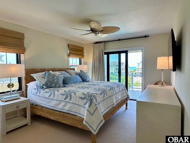 126 Buffell Head Rd Lot 146, Duck, NC 27949 - bedroom featuring access to outside, multiple windows, light carpet, and a ceiling fan